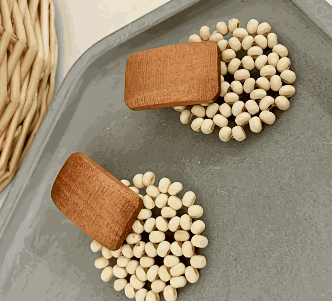 Terra Bloom Wooden Bead Earrings featuring rectangular wood on cream-toned beads, showcasing earthy elegance.