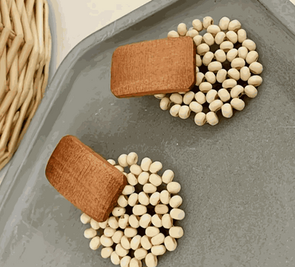 Terra Bloom Wooden Bead Earrings featuring rectangular wood on cream-toned beads, showcasing earthy elegance.